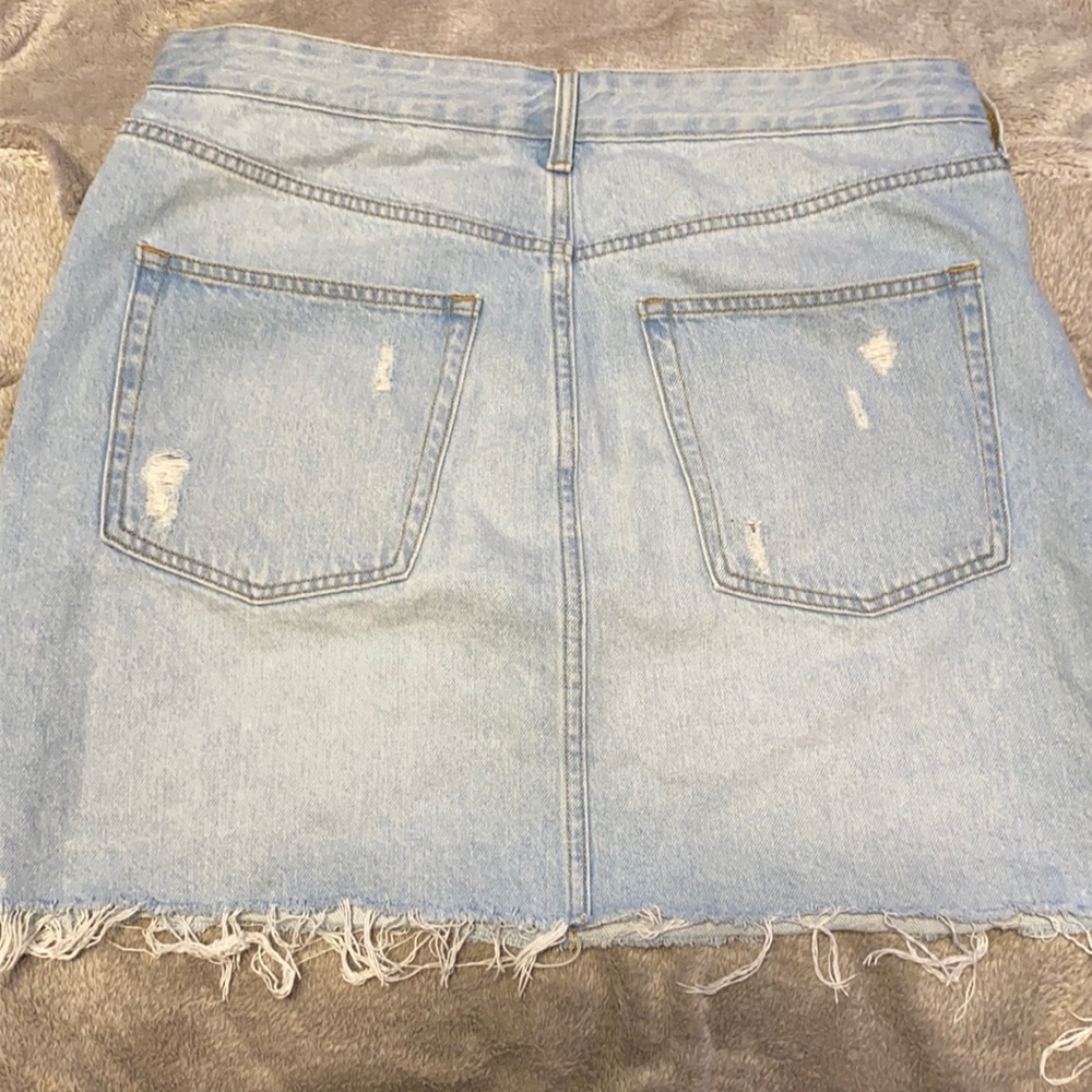 This is a H&M mid light blue skirt
